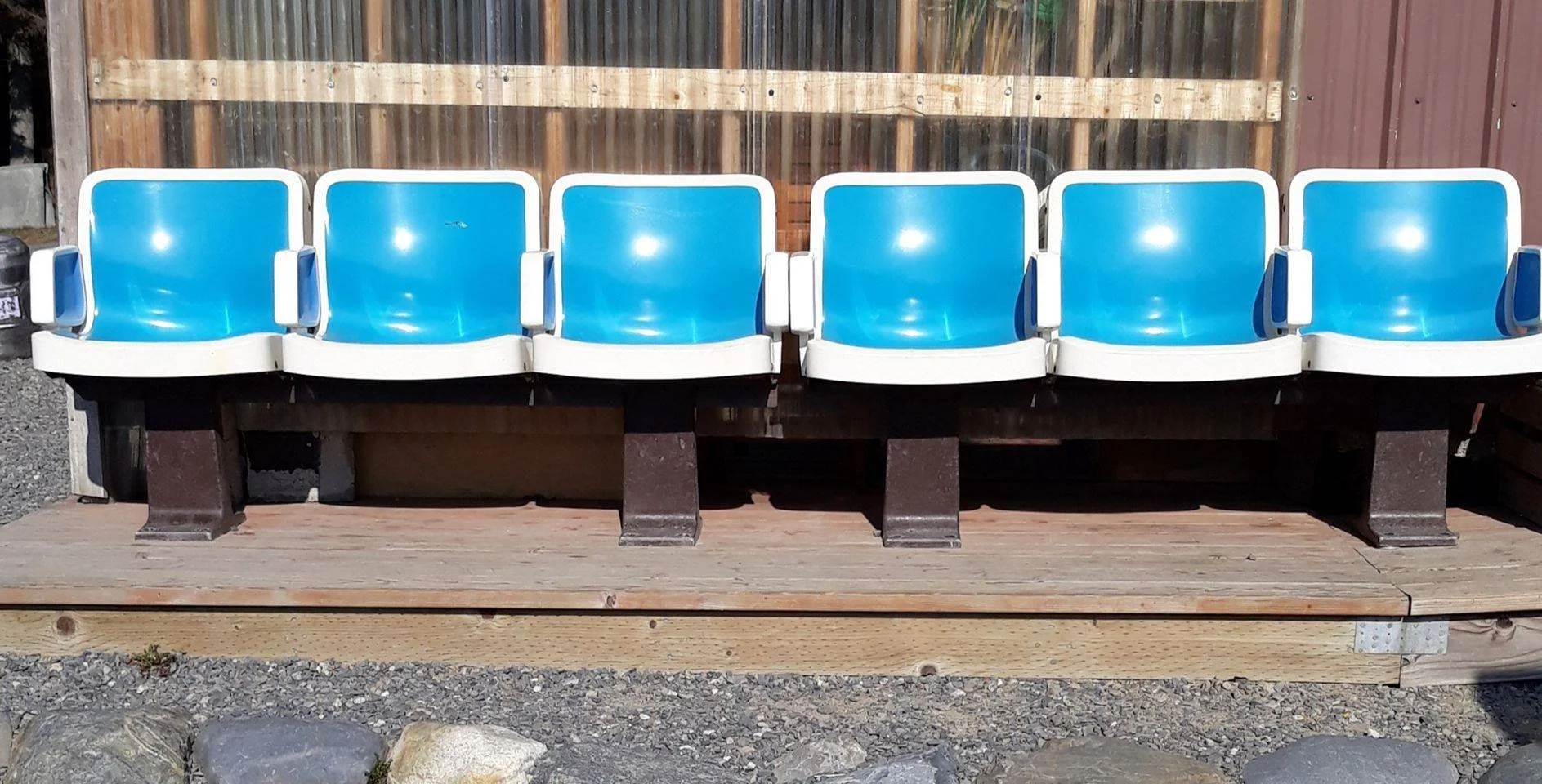 Blue outdoor seats at Homer Brewing Company